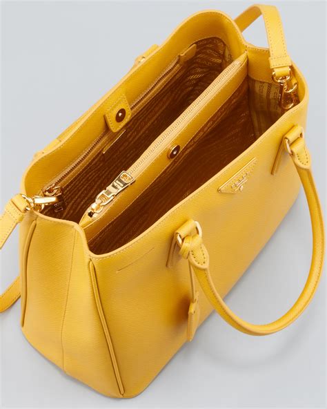 yellow sparkly prada bag|More.